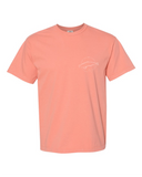 Front of Terracotta tee with small white Beluga Whale outline on chest.